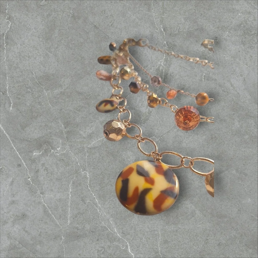 Gold and Brown Nature-Inspired Necklace with Crystal Accents